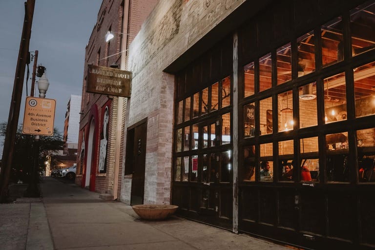 Exterior of urban brewery at dusk