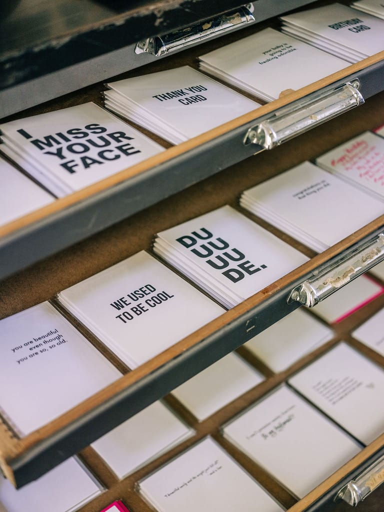 Drawer filled with greeting cards.