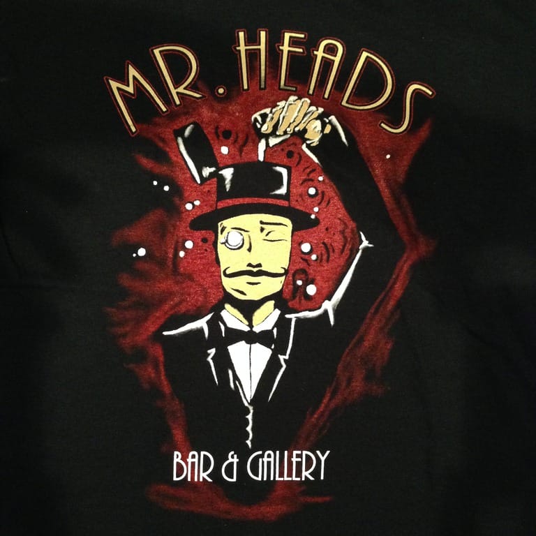 Illustration of Mr. Heads logo.