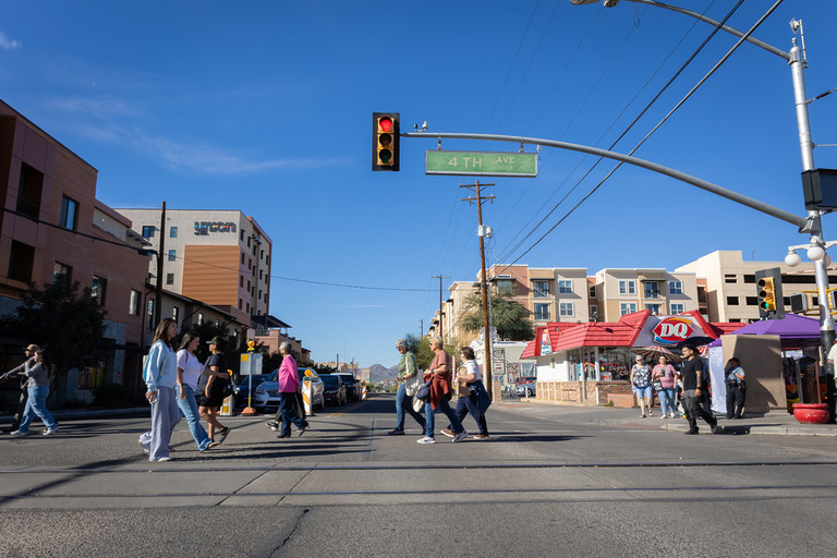 People crossing street at urban intersection