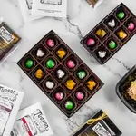 Assorted chocolates on marble background